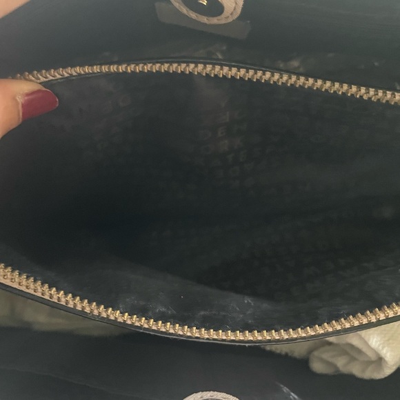 Kate spade 💕
Elegant Black and cream Handbag with Gold Accents Kate spade ♠️ - Picture 7 of 8